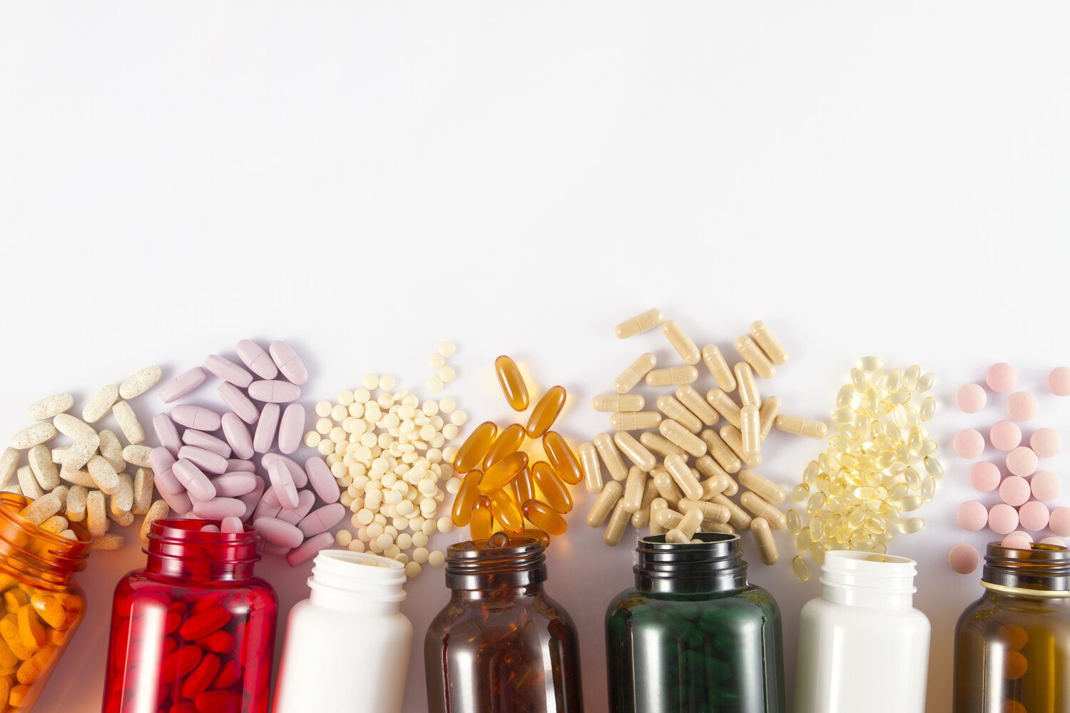 Close-up shot of medicine pills and liquid capsules